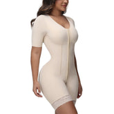 Beige shapewear garment worn by a model on a white background